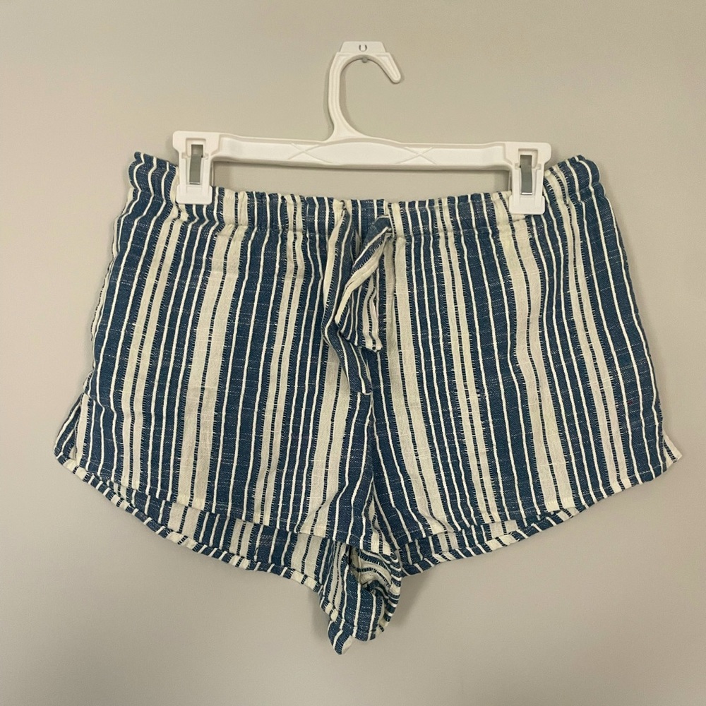 Ripcurl blue and white striped shorts with a tie. Size Medium